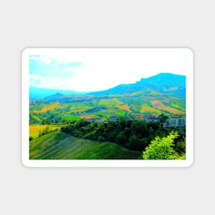 View in Castignano at Mount Ascension, fields and meadows, houses and trees Magnet