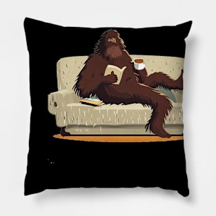 Bigfoot sit on sofa, read a book and drink coffee Pillow