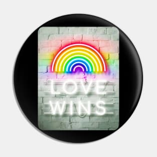 Love Wins Neon Sign on White Brick Wall Pin