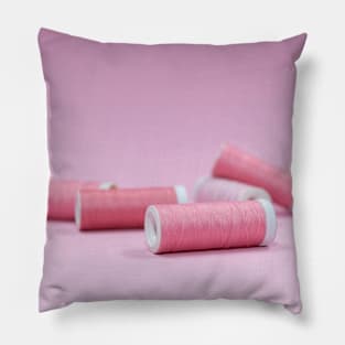 Pink pastel sewing threads on a pink background Pillow