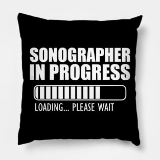 Sonographer in progress loading w Pillow