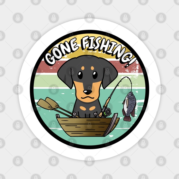 Cute dachshund dog has gone fishing Magnet by Pet Station