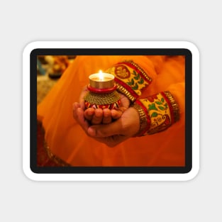 Decorative oil lamp in hand Diwali festival Magnet
