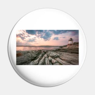 Lighthouse on a rocky beach Pin