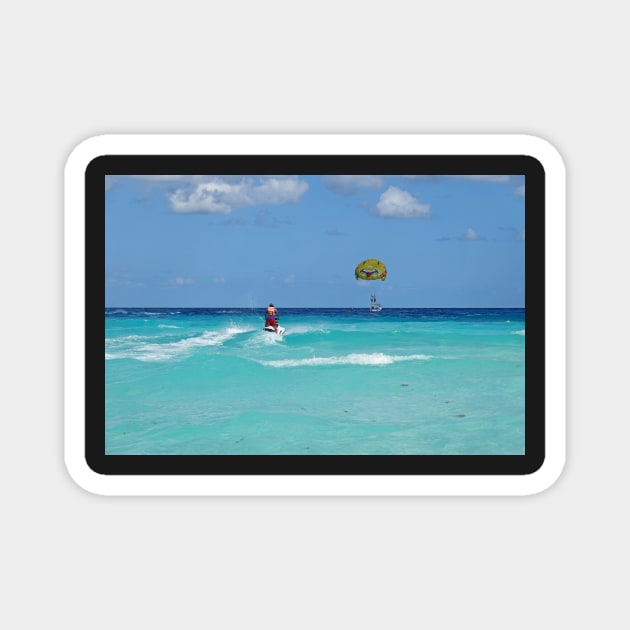 Cancun Beach Jet Skiing on the beautiful blue water Cancun Mexico Magnet by WayneOxfordPh