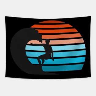 Silhouette of a surfer while surfing during sunset Tapestry