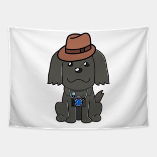 Funny black dog is holding a camera Tapestry