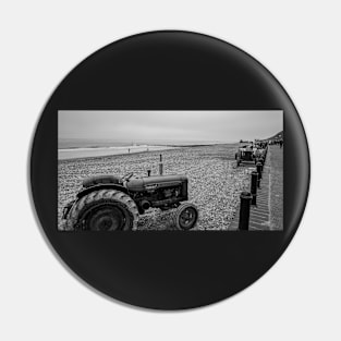 Tractor on Cromer beach on the North Norfolk coast Pin