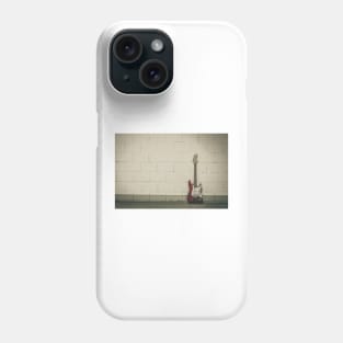 Red electric guitar against white brick wall Phone Case