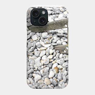 Pebbles covering a fence at  Sheringham, UK Phone Case