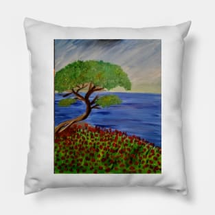 Bonzai tree over the edge of a cliff with poppies growing everywhere and a small island in the distance. Pillow