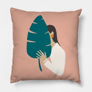 Brunette girl in white with tropical banana leaf Pillow