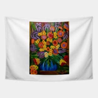 Some abstract vibrant colorful flowers in a glass vase with gold base accent Tapestry