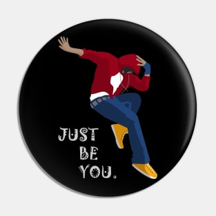 Red hooded man jumping Pin
