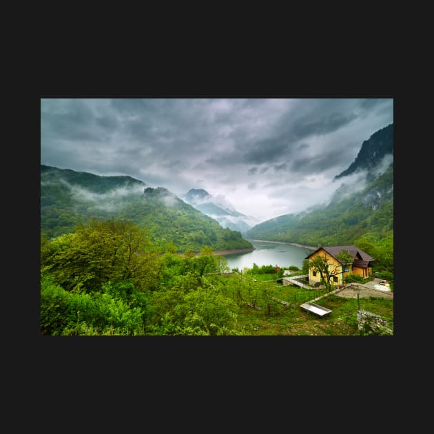 Lake in the mountains on a foggy day by naturalis