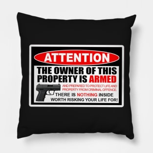 Attention the owner of this property is armed Pillow