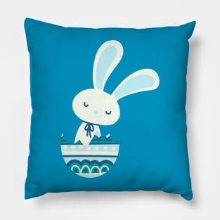 Easter rabbit in a pastel and dark blue egg shell. Pillow