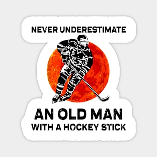 NEVER UNDERESTIMATE AN OLD MAN WITH A HOCKEY STICK Magnet