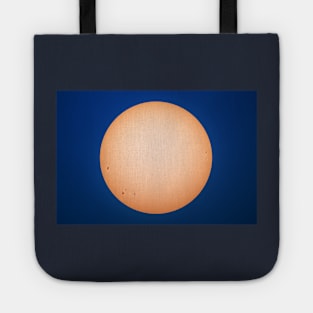 Sun and sunspots angainst blue sky Tote