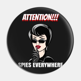 Woman with finger showing hush silence sign and Spies Everywhere wording Pin