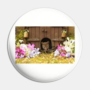 George the mouse in a log pile House spring flowers at the door Pin