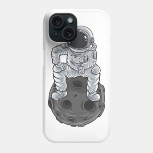 astronaut is thinking something while sitting on the moon Phone Case