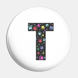 T letter  with colorful paw print Pin