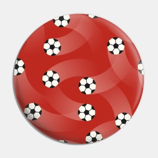 Soccer balls on red background Pin