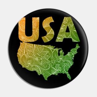 Colorful mandala art map of the United States of America with text in green and orange Pin