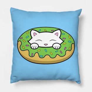 Cute kitten eating a green doughnut with sprinkles on top of it on St. Patrick's day Pillow