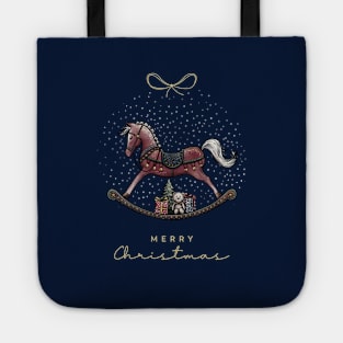 Merry Christmas lettering with Rocking Horse illustration, cute bear, gifts and Christmas tree on a blue snow background. Tote