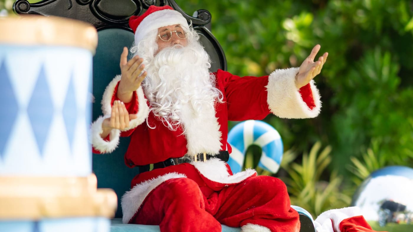 Father Christmas in the gardens of the Waldorf Astoria Maldives Ithaafushi during the festive season