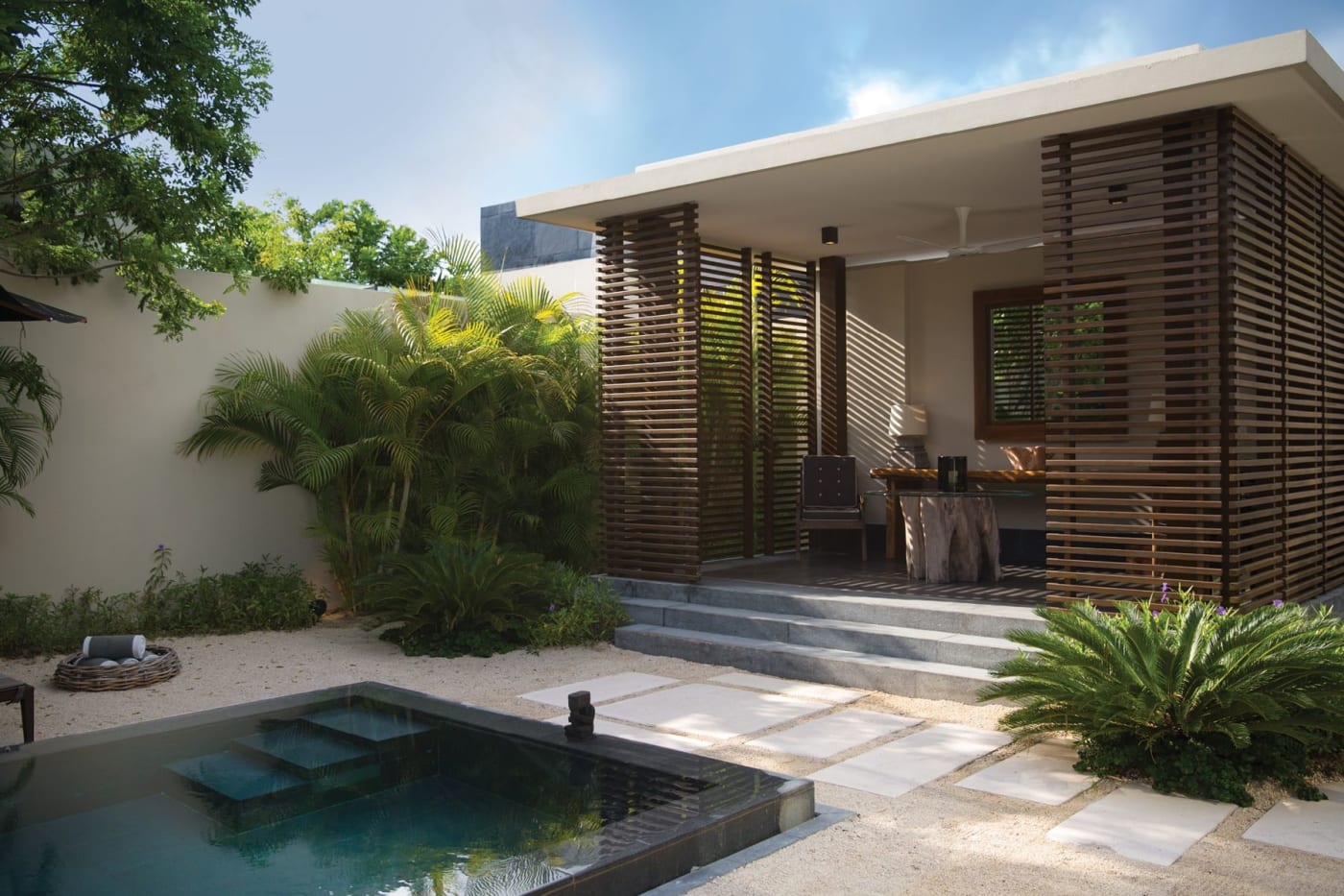 Une villa du NIZUC Resort & Spa, à Cancún, avec sa piscine privée et son jardin tropical