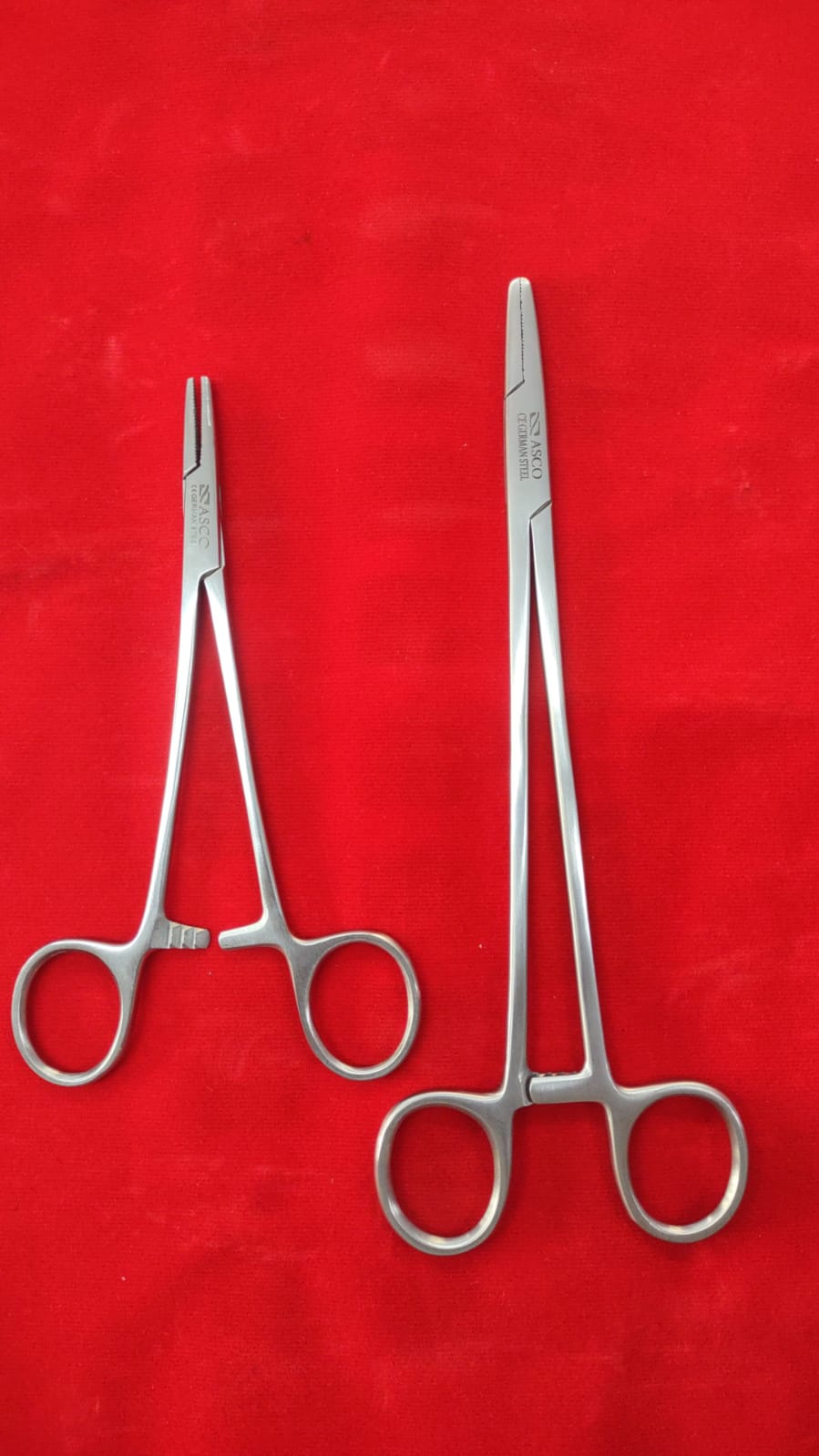 NEEDLE HOLDER