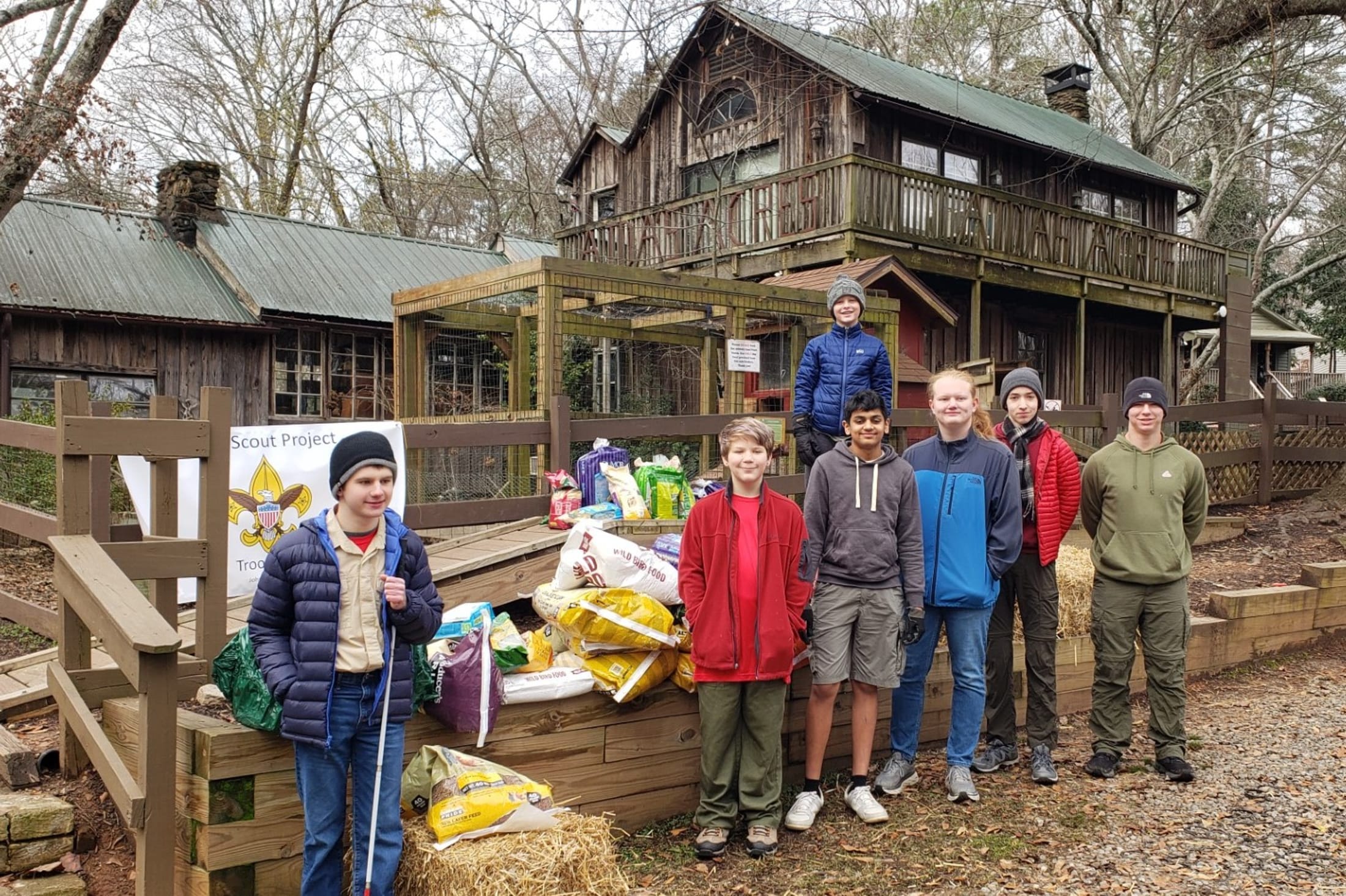 Mason and other Scouts from Troop 629 pose for a group photo in front of Autrey Mill Nature Preserve during Mason's Eagle project.