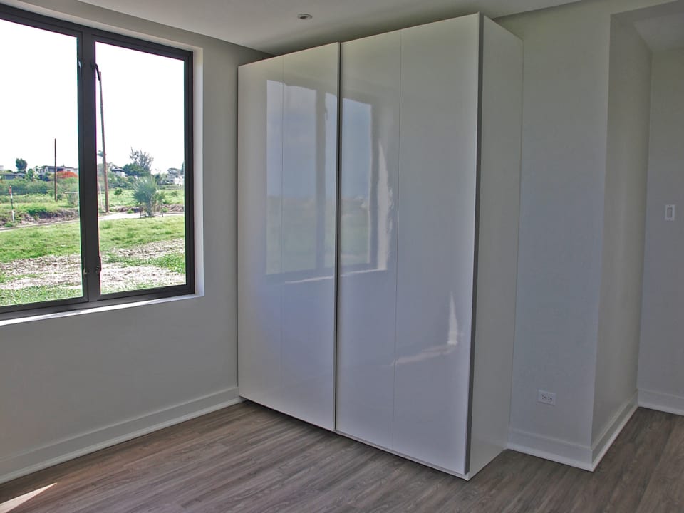 Bedroom with built-in closets