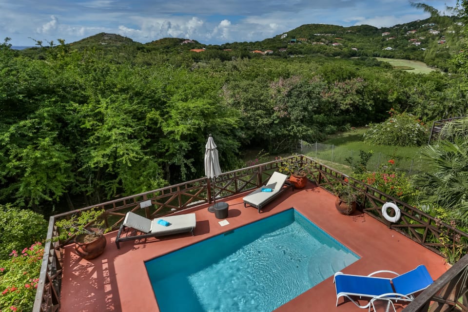 Pool Area with the view of the golf course in the back