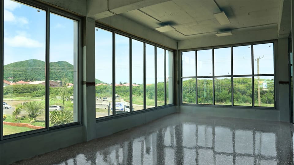 2nd floor - the epoxy flooring is only a rendering; view looking towards the highway - Rodney Bay