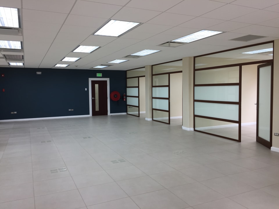 2nd floor open plan space with 7 private offices