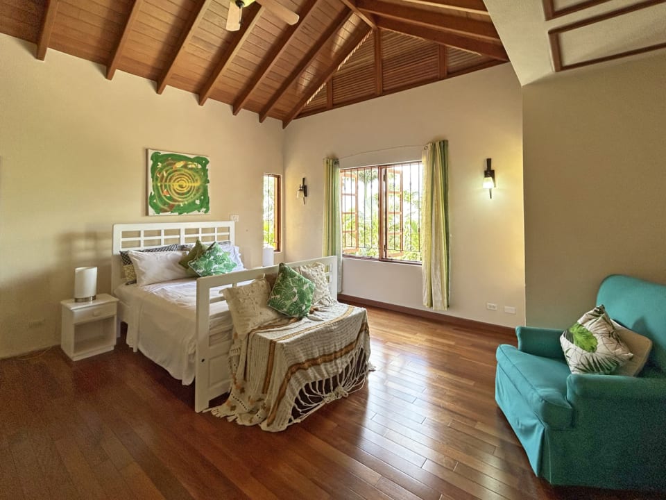 Main bedroom overlooking the pool deck