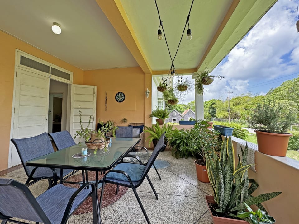 Patio upstairs overlooking the garden and golfcourse