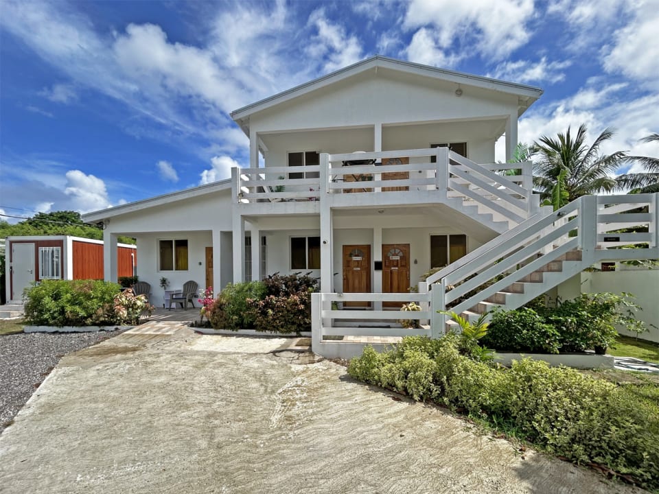 Glitter Bay Terrace. Unit is the one on the far left of the ground floor