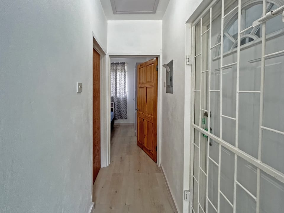 Hallway to bedroom and bathroom