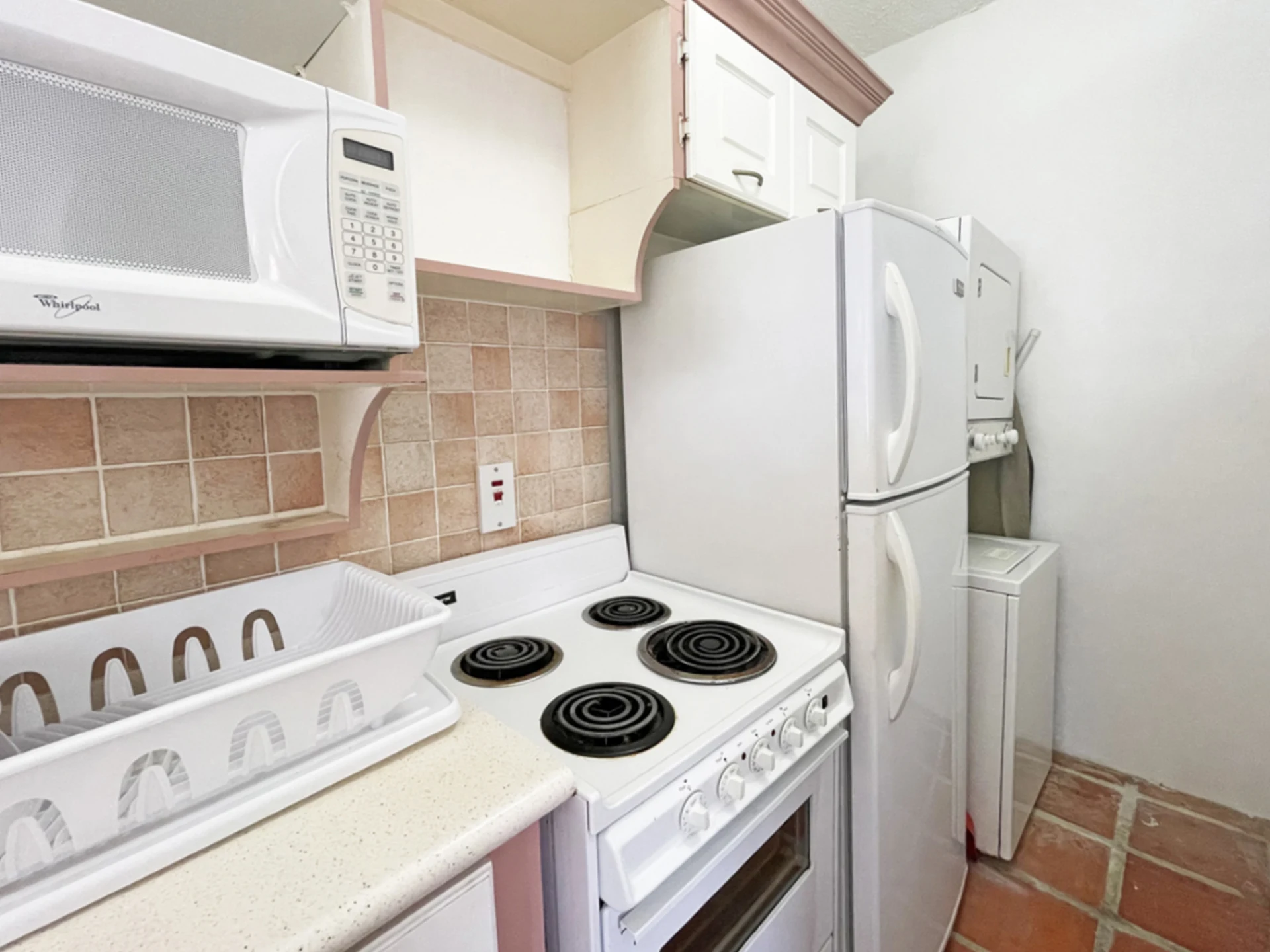 Kitchen with washer and dryer