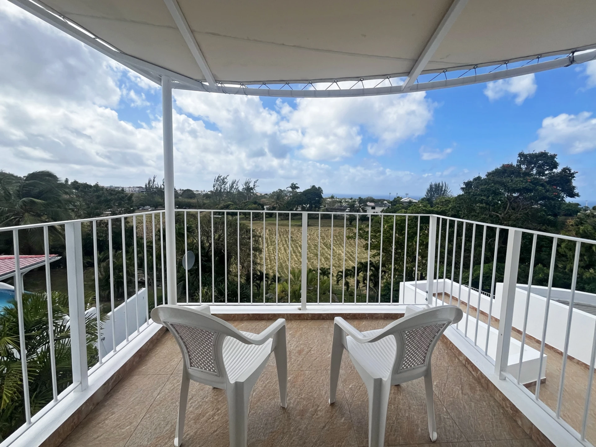 Distant, partial sea views from upper balcony