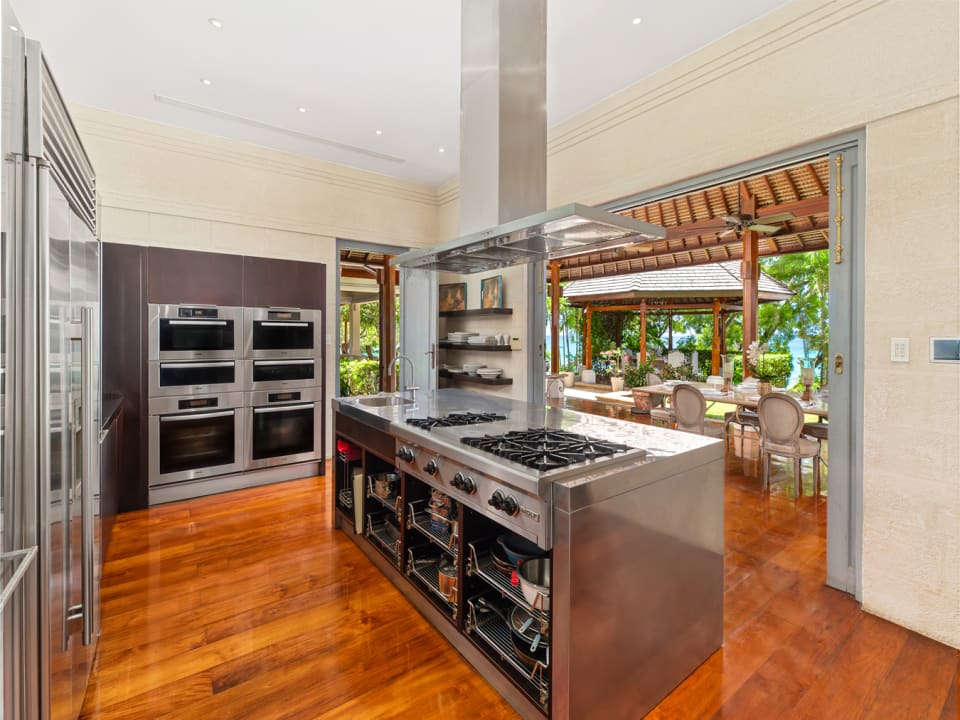 Industrial Grade Kitchen Opening onto the Dining Areas