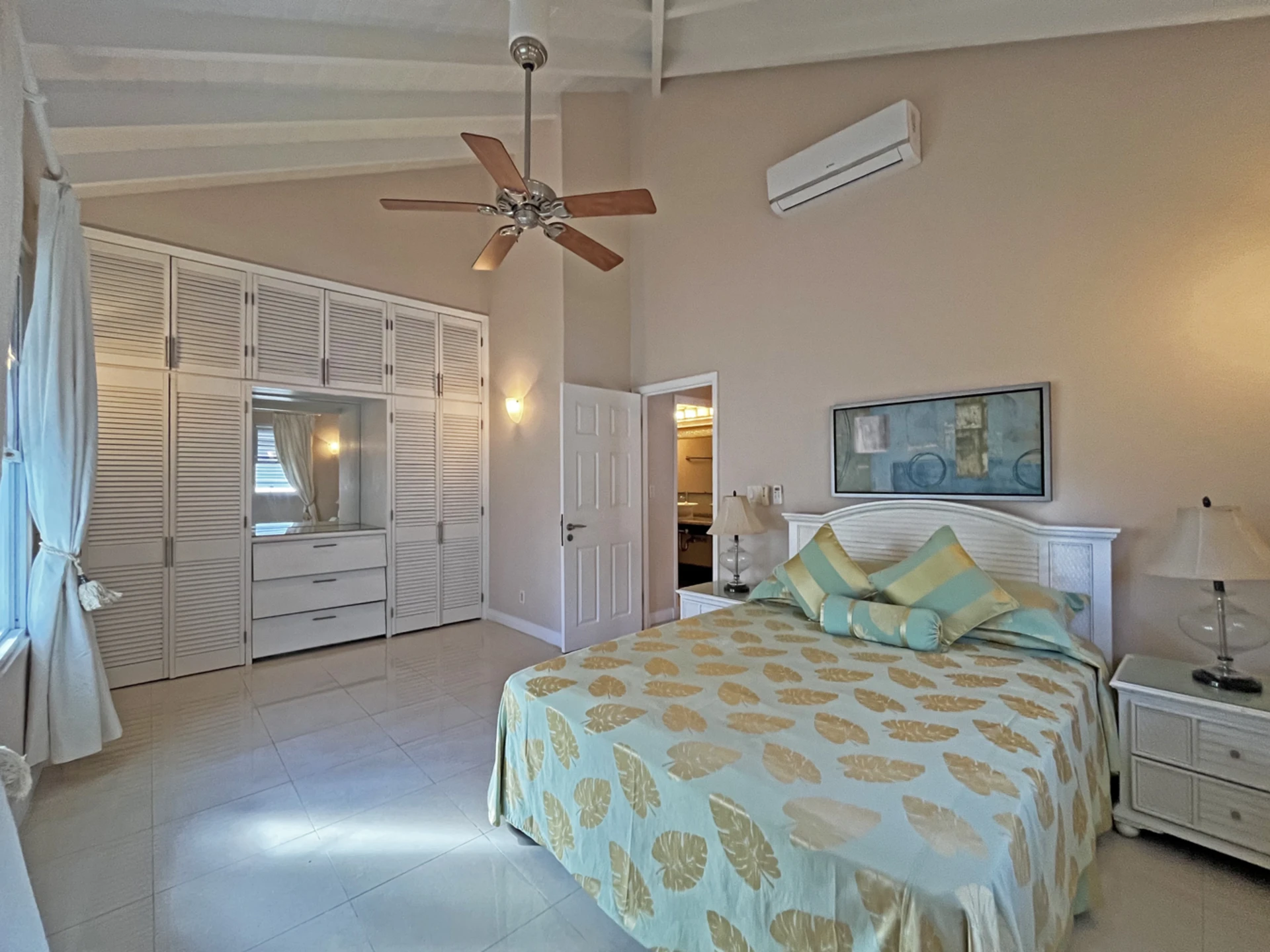 Spacious, guest bedroom with queen bed