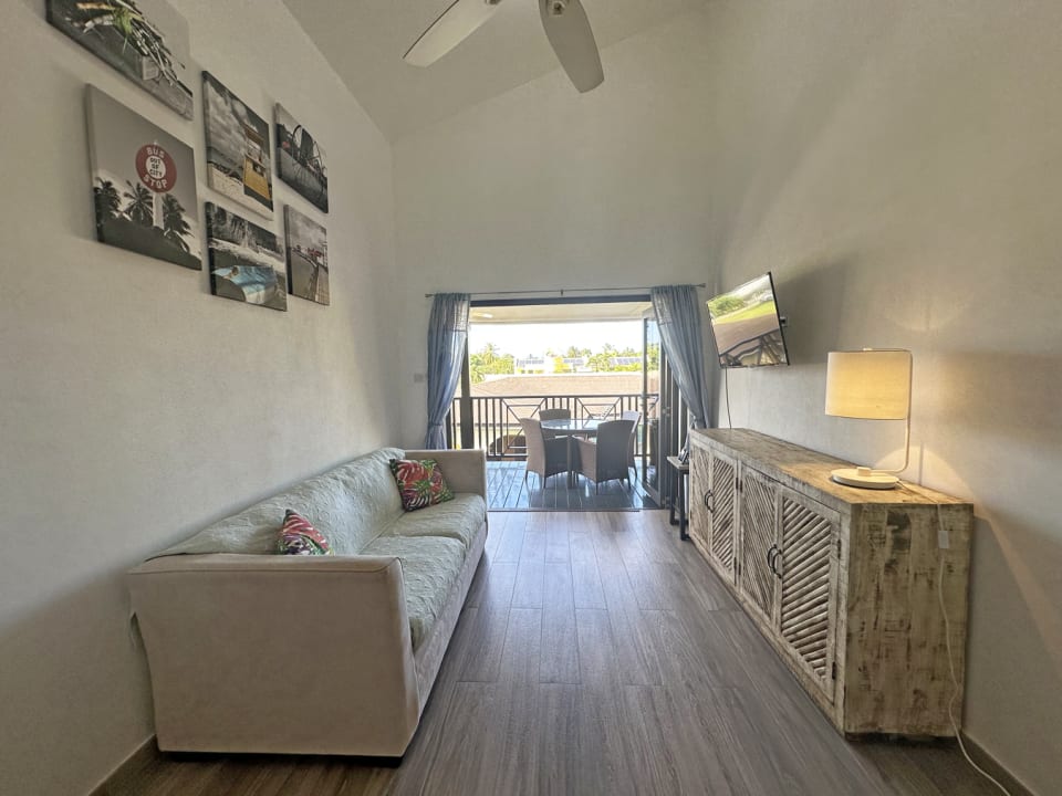 Open plan kitchen/ living space leading to patio deck