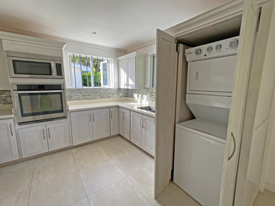 Laundry closet in kitchen