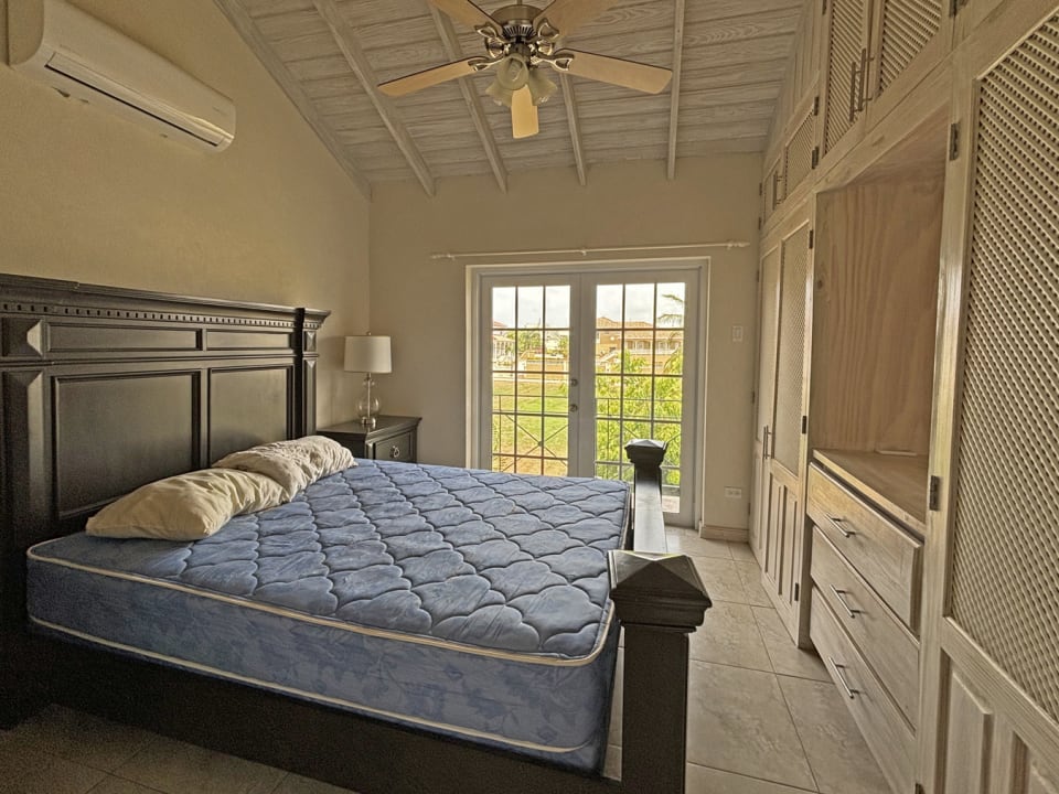 Primary bedroom with fitted wardrobes